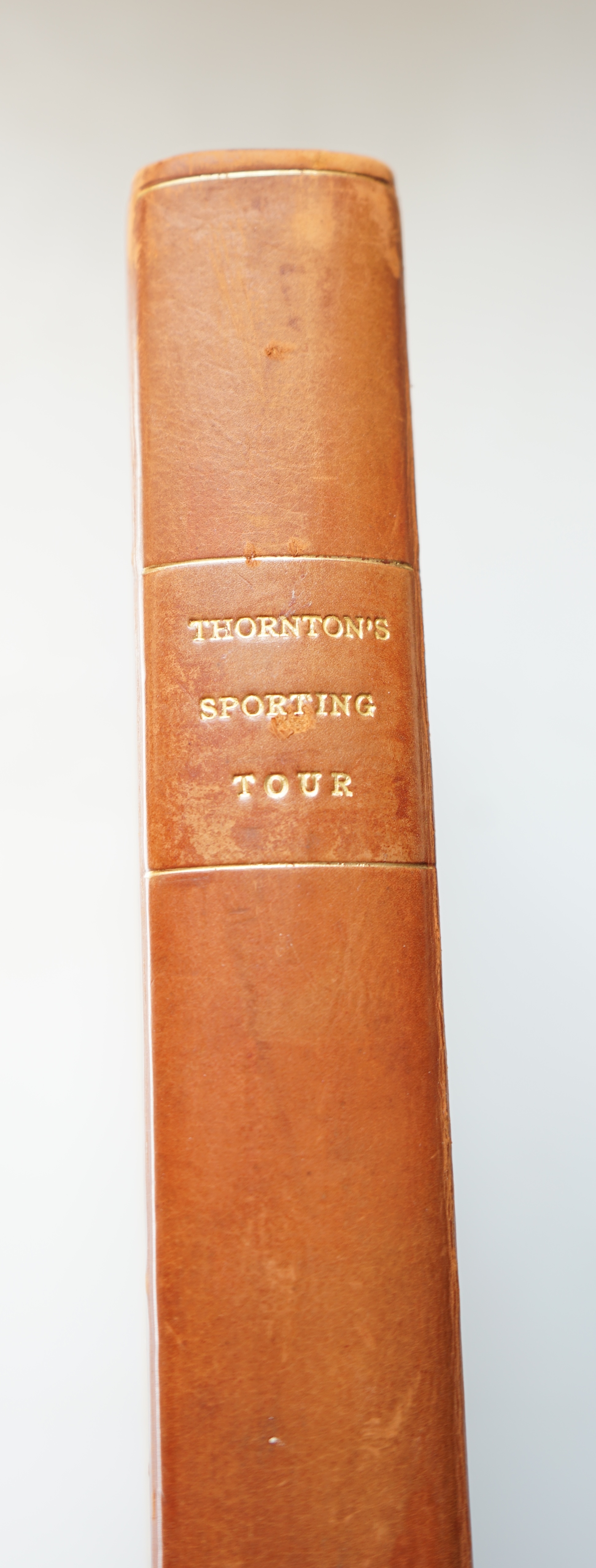 Thornton, Col. Thomas - A Sporting Tour through the Northern parts of England and Great part of the Highlands of Scotland, 4to, rebound half calf, engraved frontispiece and 15 plates, London, 1804.